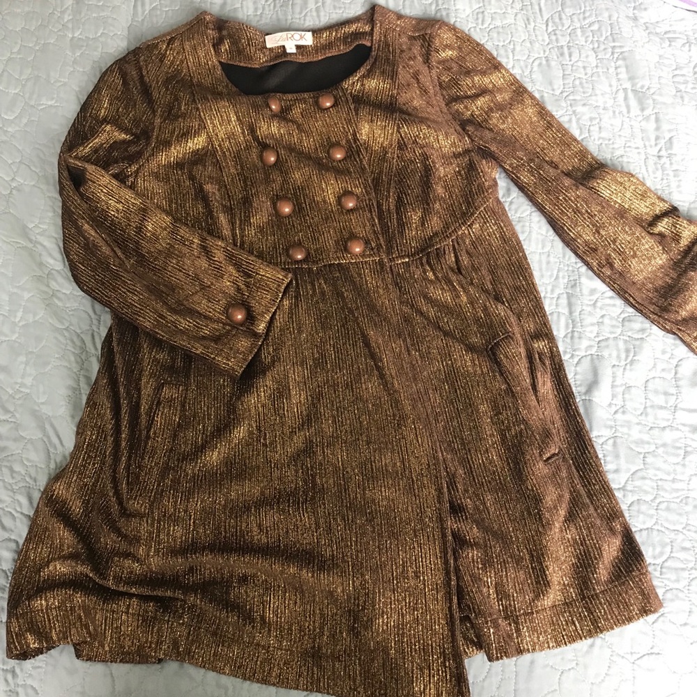 LaRok gold glimmer light jacket.